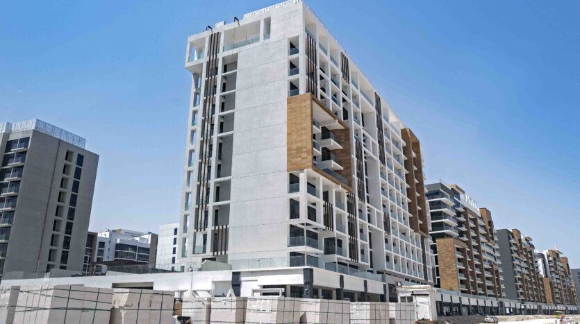 Aerial community view of Azizi Riviera in Meydan showing residential buildings, boulevards, and waterfront design in Dubai.